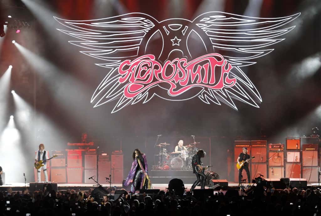 Aerosmith performs at Tom Benson Hall of Fame Stadium as part of Pro Football Hall of Fame weekend events Friday, Aug. 7, 2015, in Canton, Ohio. (AP Photo/Tom E. Puskar)